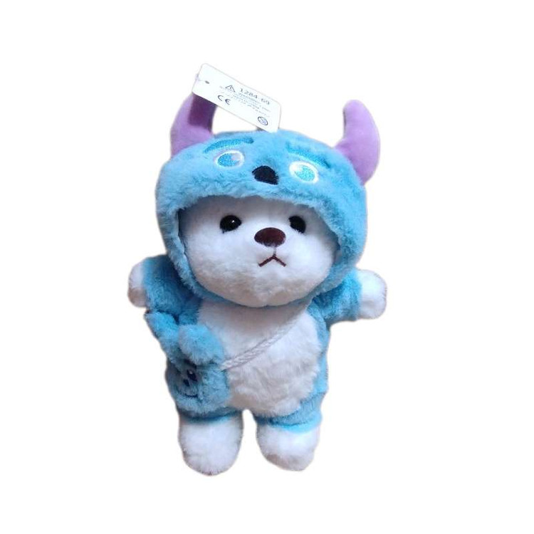 عروسک خرس سالیوان با لباس سرهمی و کیف، مناسب برای بازی کودکانه و دکور اتاق خواب