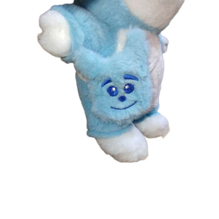 عروسک پولیشی خرس با لباس کارتونی و کیف کوچک، مناسب برای طرفداران شخصیتهای بانمک